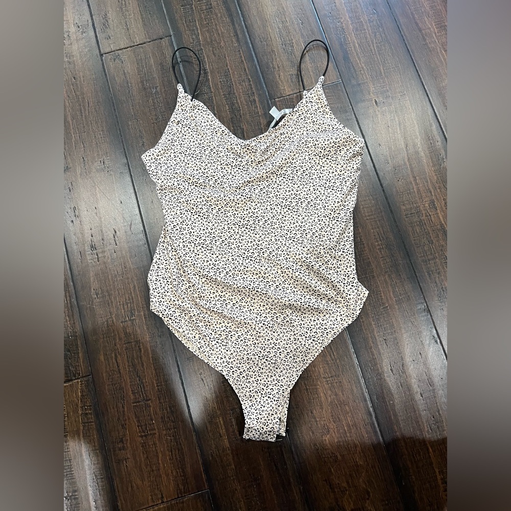 Never worn Small Gaze cheetah bodysuit